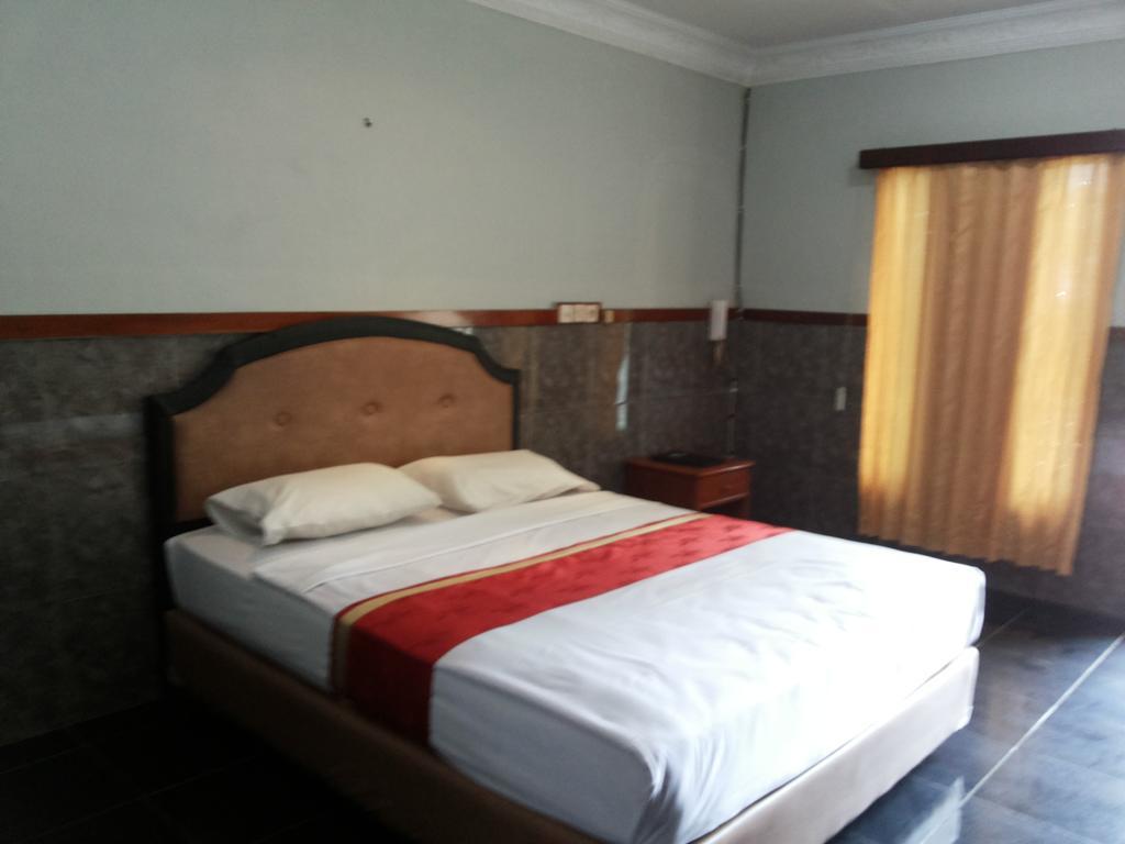 Pasir Putih Resort Бенгкулу Номер фото